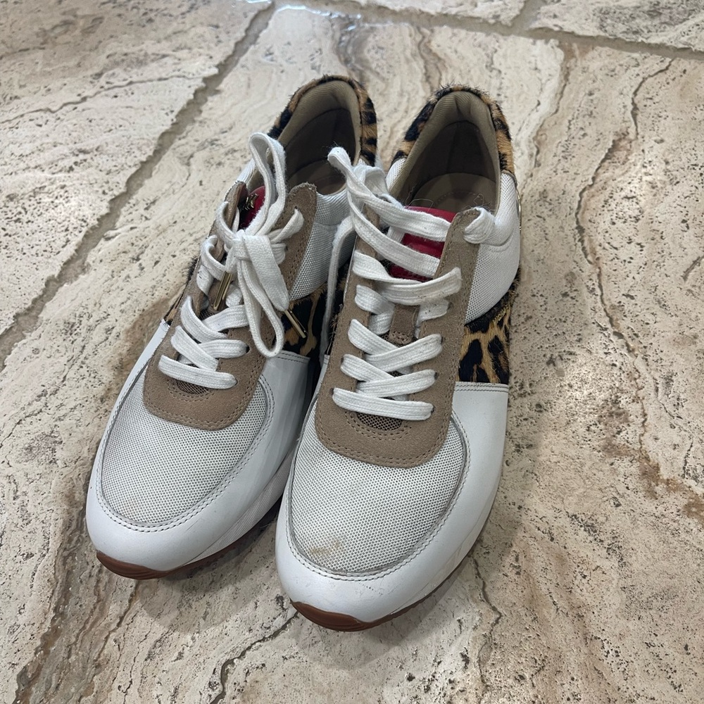Women’s Michael Kors white and leopard print tennis shoe, size 8.5